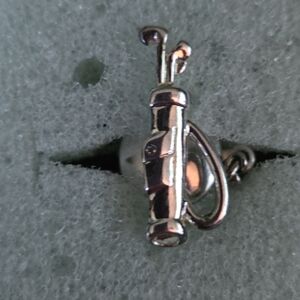 Silver golf club tie tack